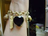 Ladies' Clunky Goldtone Charm Bracelet in Luke AFB, Arizona